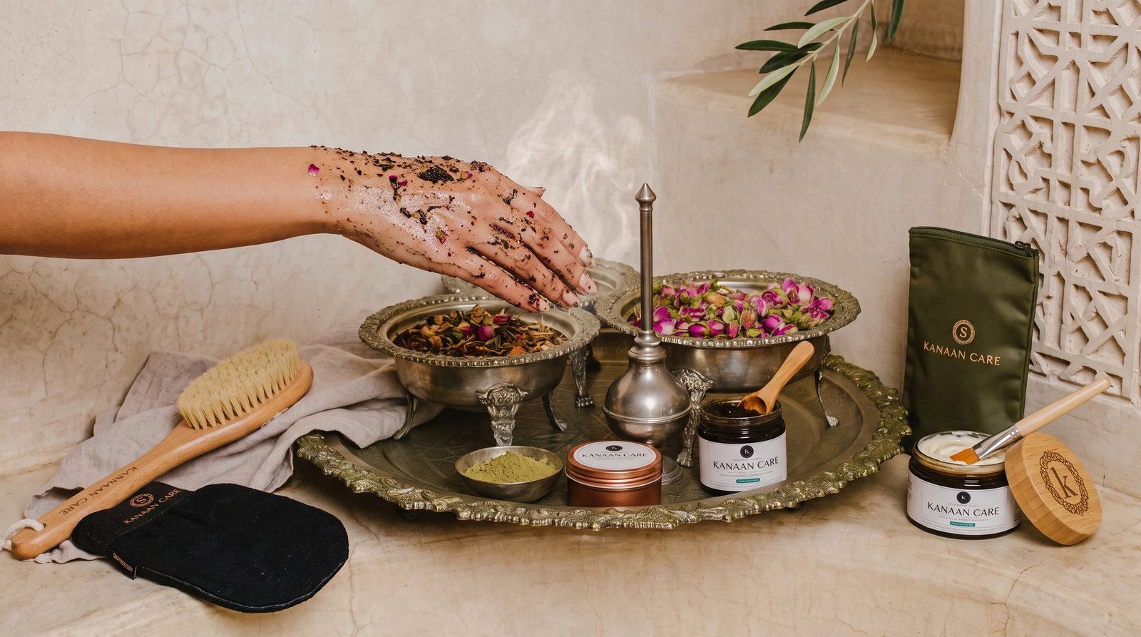 Kanaan Care natural-care collection with Sidr, henna, a Moroccan bath brush and clay mask
